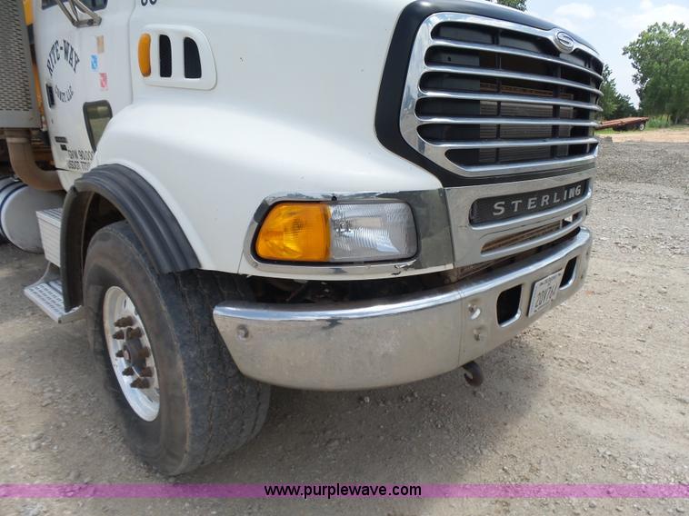 image for item K3175 2005 Sterling flatbed truck with knuckle boom