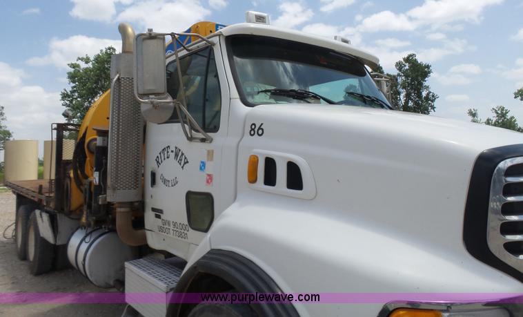 image for item K3175 2005 Sterling flatbed truck with knuckle boom