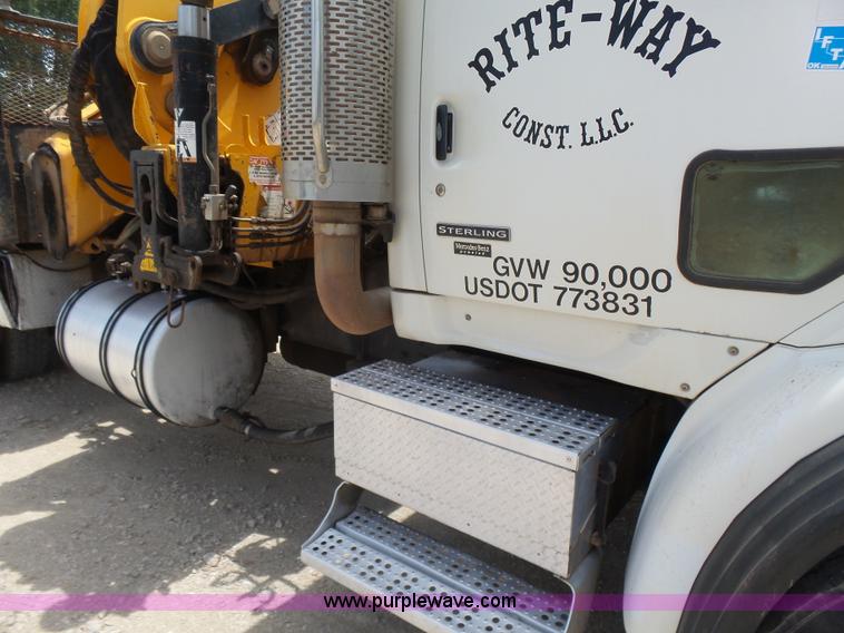 image for item K3175 2005 Sterling flatbed truck with knuckle boom