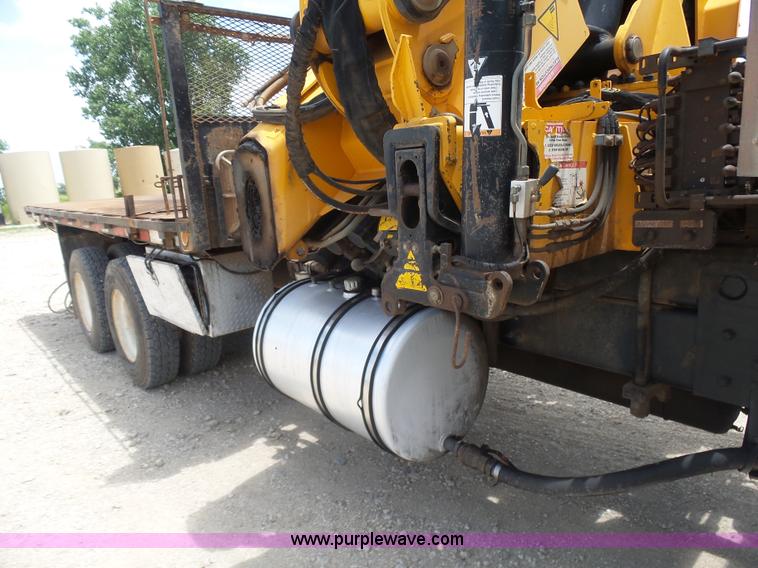 image for item K3175 2005 Sterling flatbed truck with knuckle boom