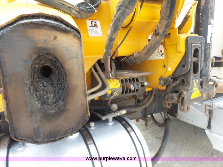 image for item K3175 2005 Sterling flatbed truck with knuckle boom