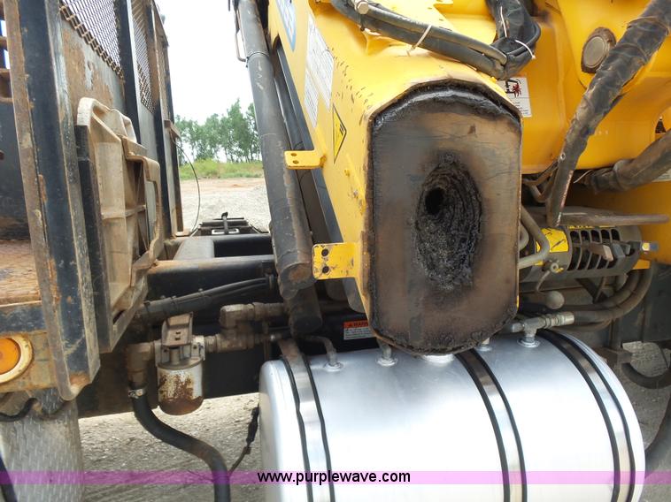 image for item K3175 2005 Sterling flatbed truck with knuckle boom