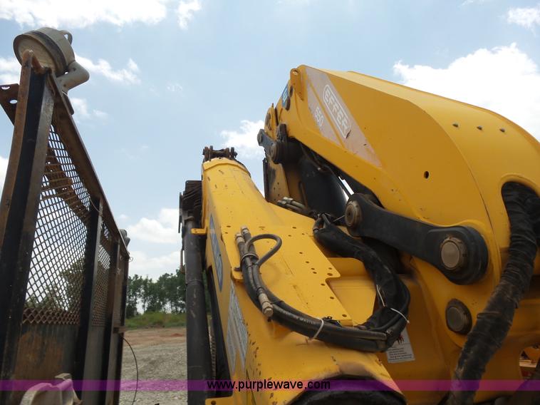 image for item K3175 2005 Sterling flatbed truck with knuckle boom