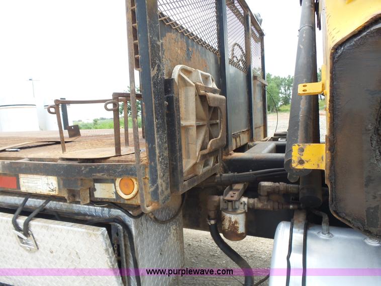 image for item K3175 2005 Sterling flatbed truck with knuckle boom
