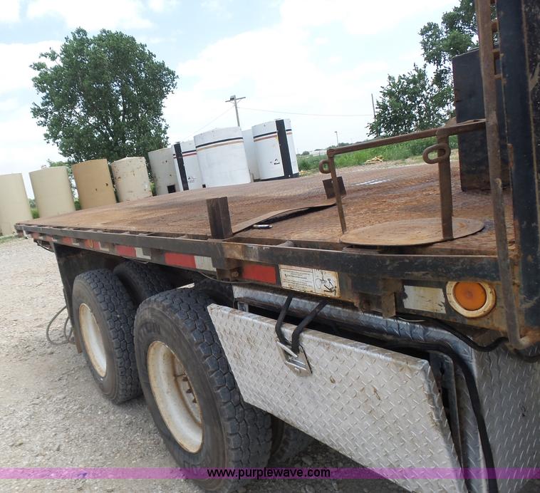 image for item K3175 2005 Sterling flatbed truck with knuckle boom