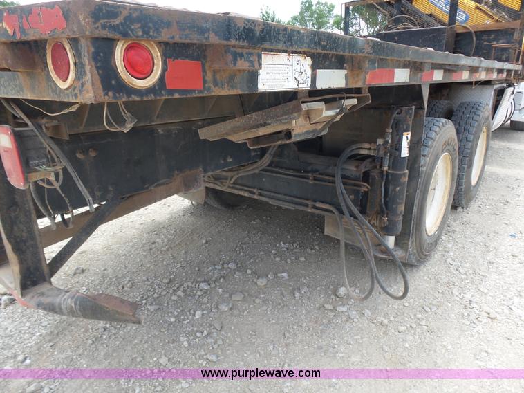 image for item K3175 2005 Sterling flatbed truck with knuckle boom