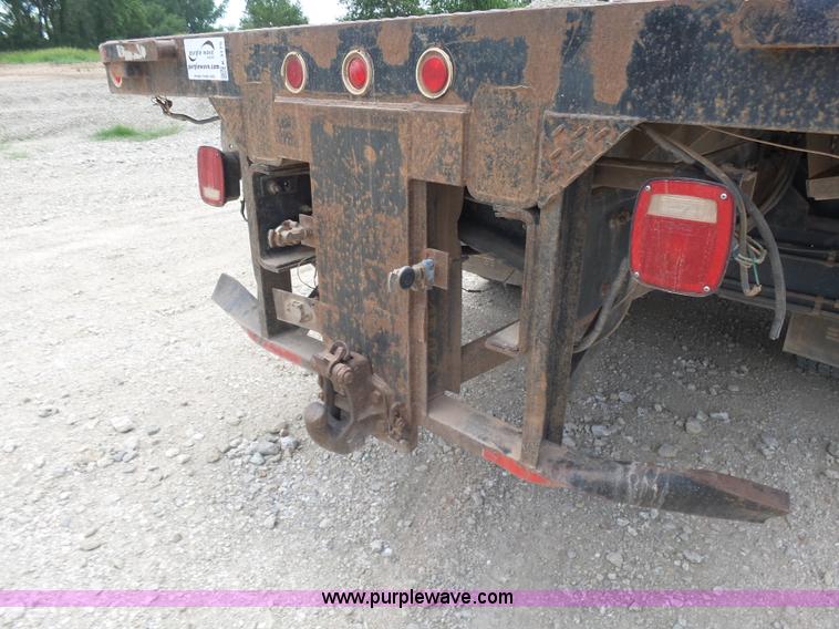 image for item K3175 2005 Sterling flatbed truck with knuckle boom