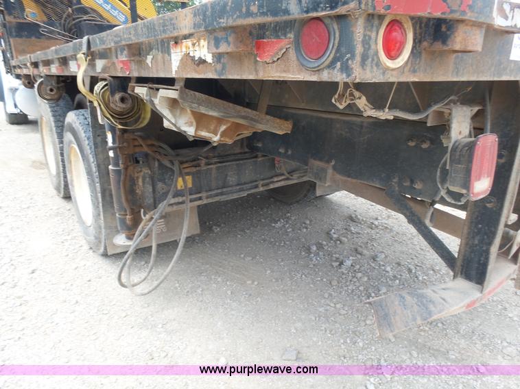 image for item K3175 2005 Sterling flatbed truck with knuckle boom