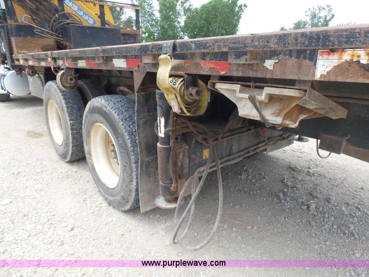 image for item K3175 2005 Sterling flatbed truck with knuckle boom