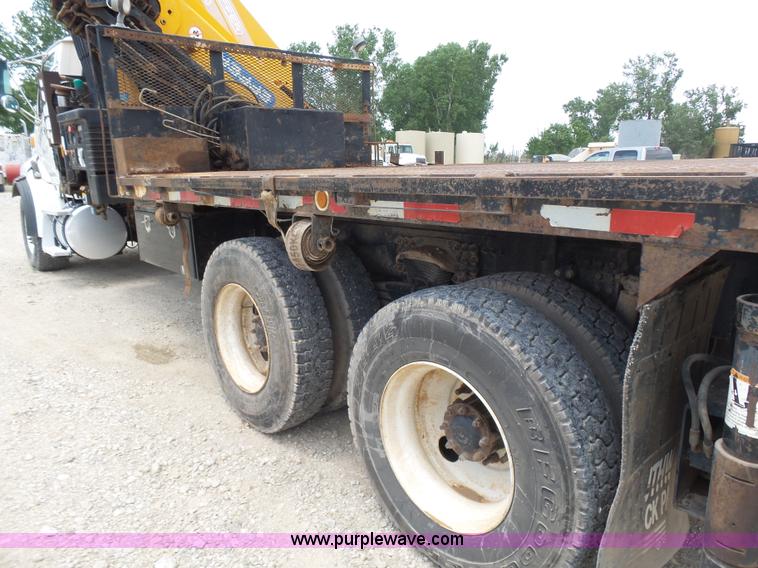 image for item K3175 2005 Sterling flatbed truck with knuckle boom
