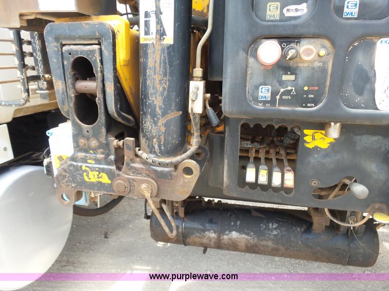 image for item K3175 2005 Sterling flatbed truck with knuckle boom