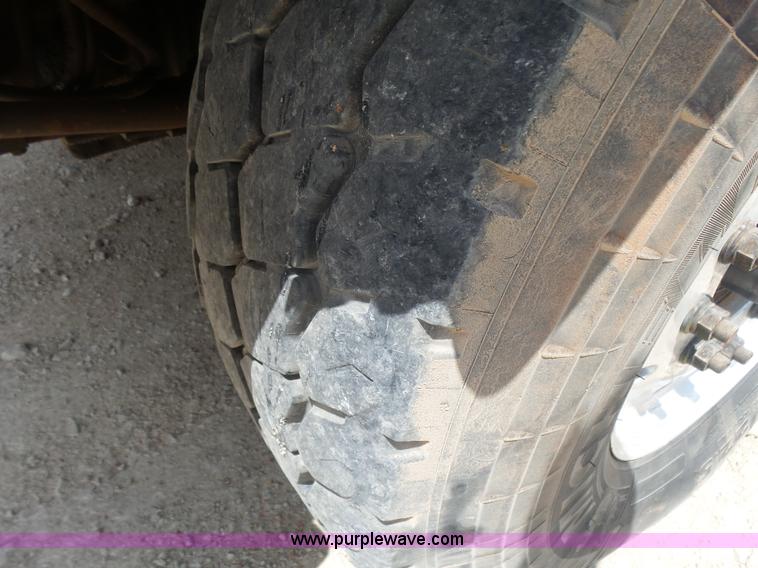 image for item K3175 2005 Sterling flatbed truck with knuckle boom