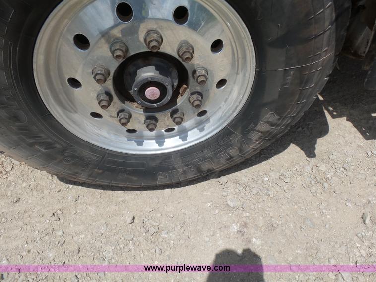 image for item K3175 2005 Sterling flatbed truck with knuckle boom