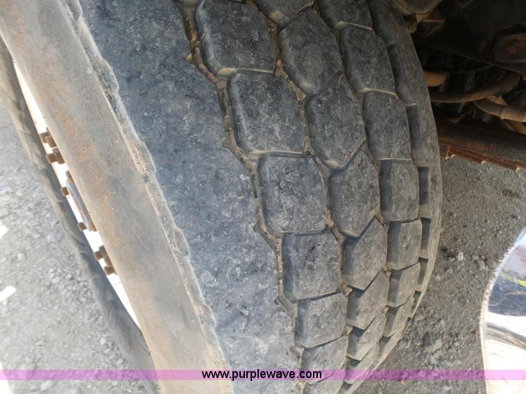 image for item K3175 2005 Sterling flatbed truck with knuckle boom