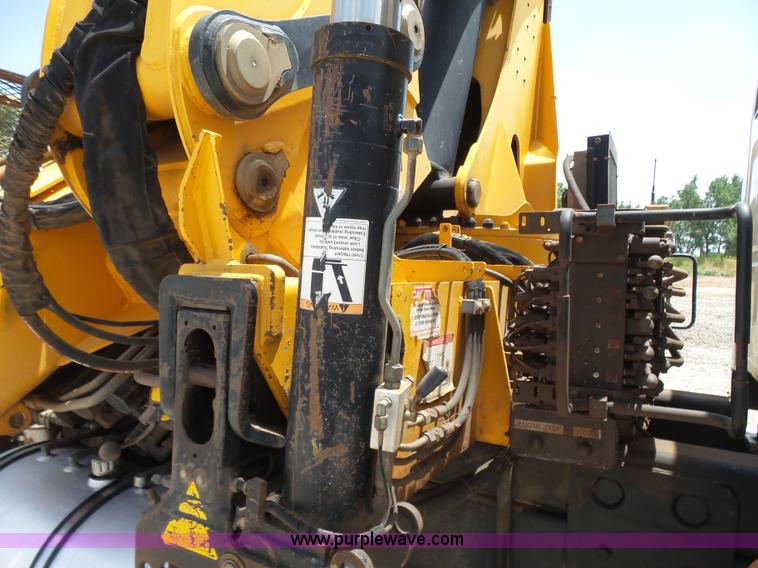 image for item K3175 2005 Sterling flatbed truck with knuckle boom