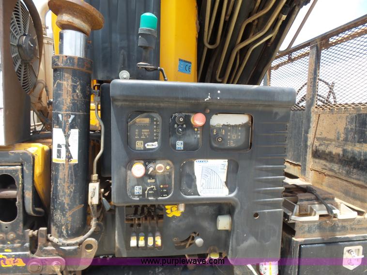 image for item K3175 2005 Sterling flatbed truck with knuckle boom