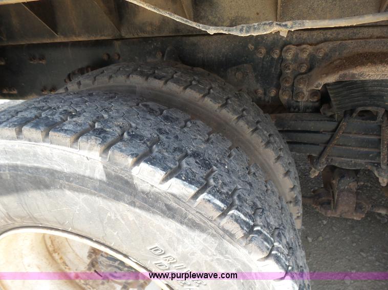 image for item K3175 2005 Sterling flatbed truck with knuckle boom