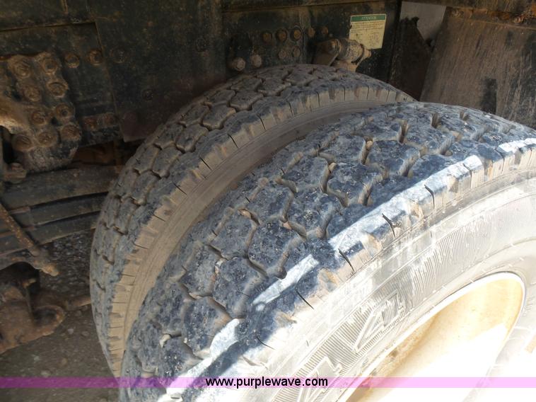 image for item K3175 2005 Sterling flatbed truck with knuckle boom