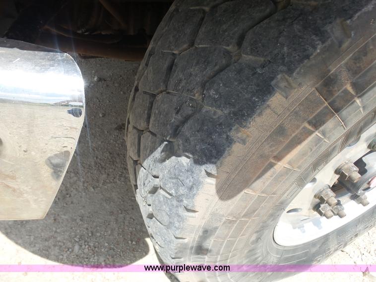 image for item K3175 2005 Sterling flatbed truck with knuckle boom