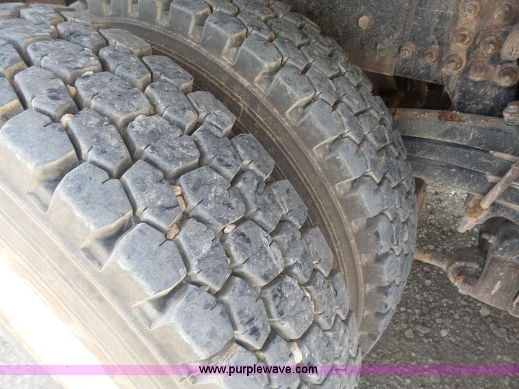 image for item K3175 2005 Sterling flatbed truck with knuckle boom