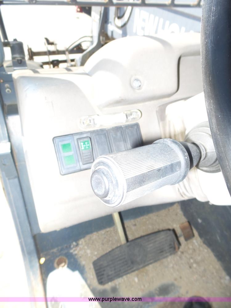image for item K8404 2000 New Holland LM850 telehandler