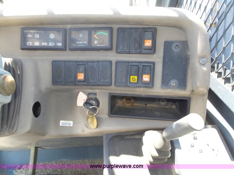 image for item K8404 2000 New Holland LM850 telehandler