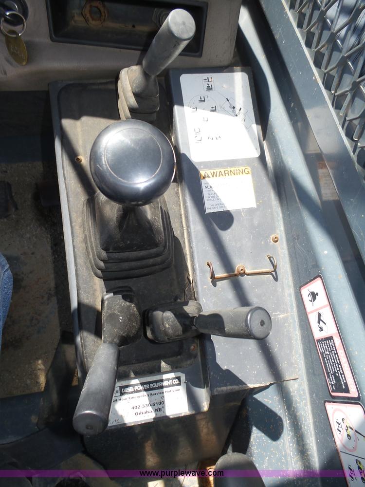 image for item K8404 2000 New Holland LM850 telehandler