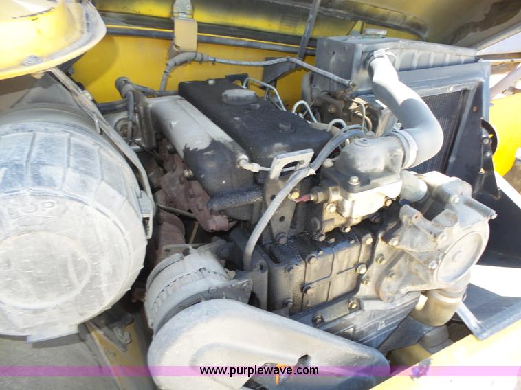 image for item K8404 2000 New Holland LM850 telehandler