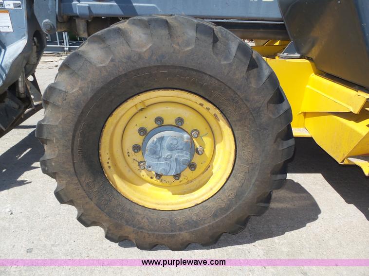 image for item K8404 2000 New Holland LM850 telehandler
