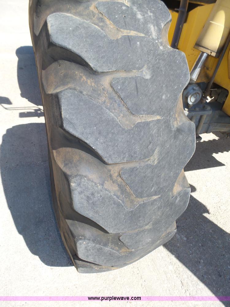 image for item K8404 2000 New Holland LM850 telehandler