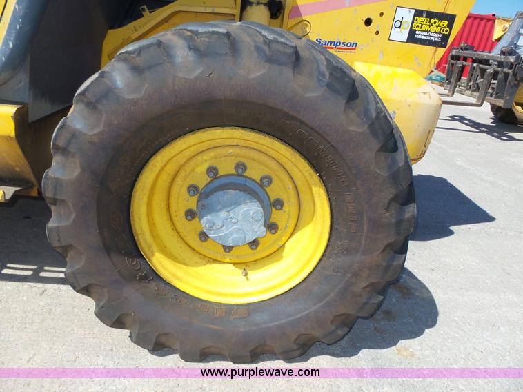 image for item K8404 2000 New Holland LM850 telehandler