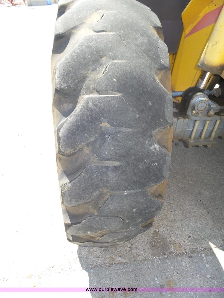 image for item K8404 2000 New Holland LM850 telehandler