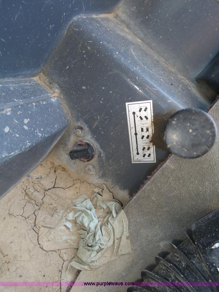 image for item K8406 New Holland LM860 low profile telehandler