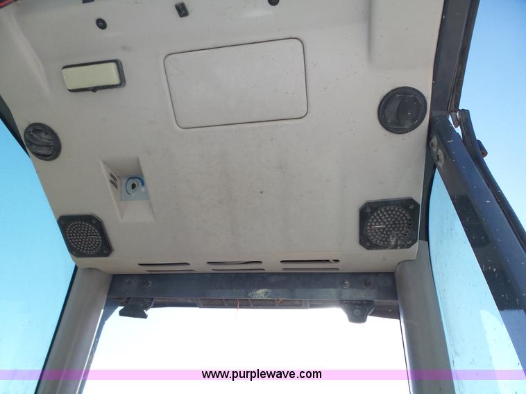 image for item K8406 New Holland LM860 low profile telehandler