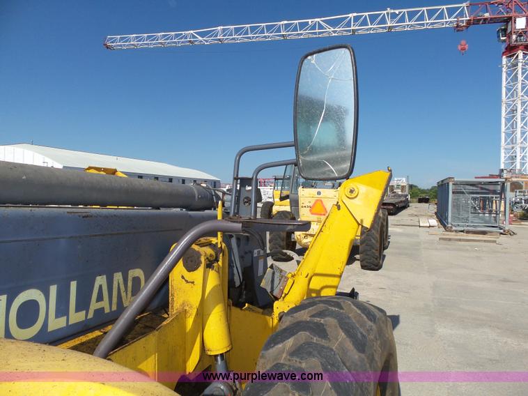 image for item K8406 New Holland LM860 low profile telehandler