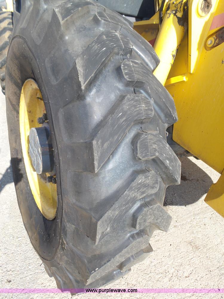 image for item K8406 New Holland LM860 low profile telehandler