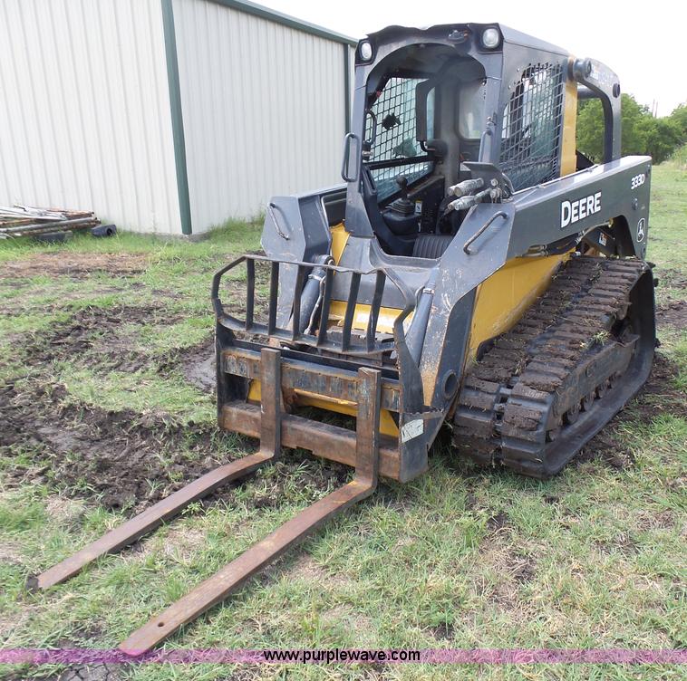 image for item L1579 2010 John Deere 333D skid steer
