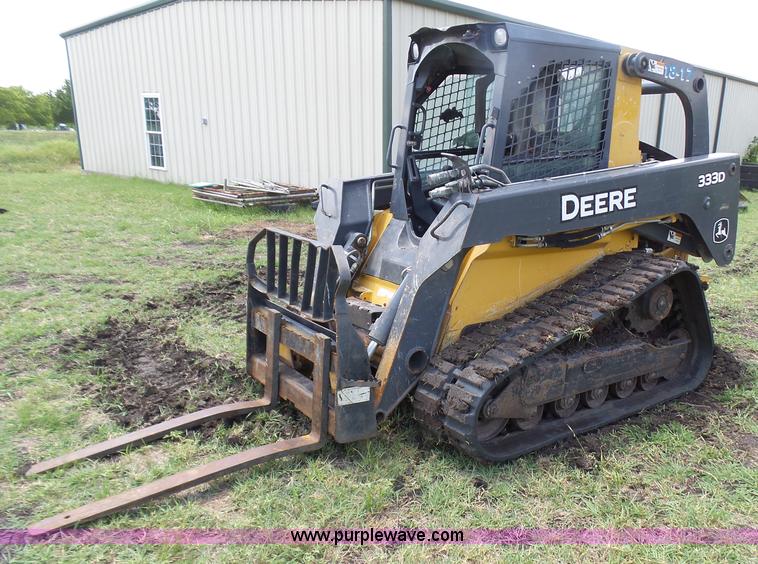 image for item L1579 2010 John Deere 333D skid steer