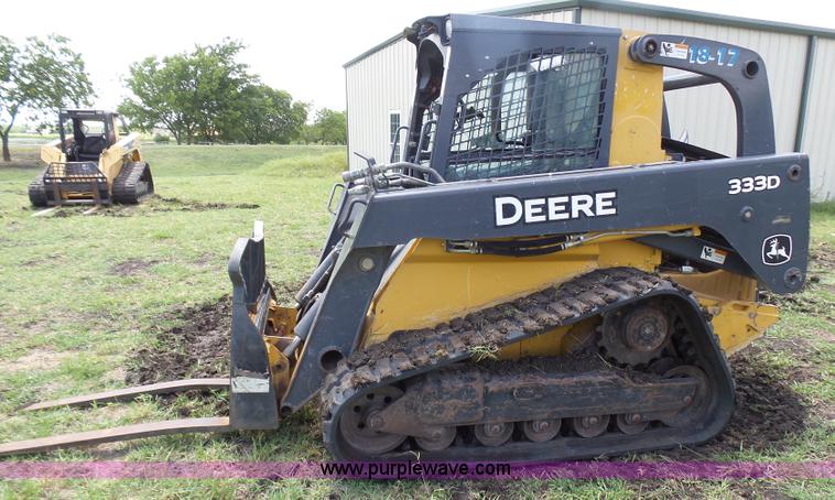 image for item L1579 2010 John Deere 333D skid steer