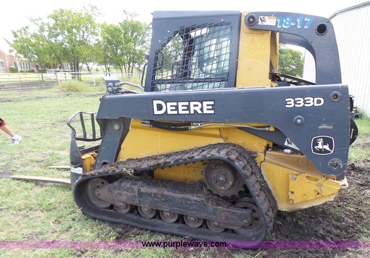 image for item L1579 2010 John Deere 333D skid steer