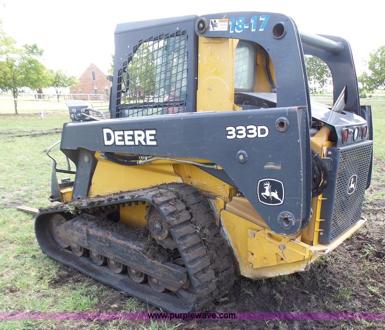 image for item L1579 2010 John Deere 333D skid steer