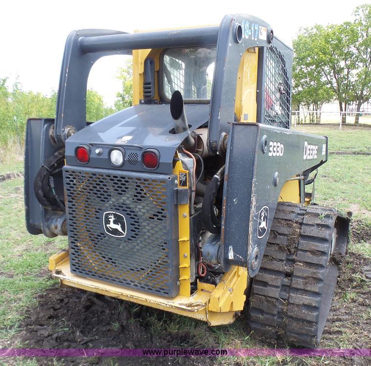 image for item L1579 2010 John Deere 333D skid steer