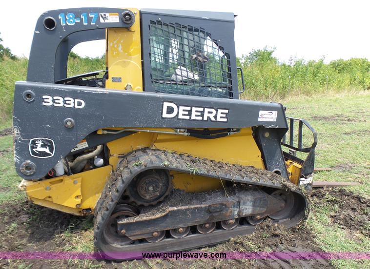 image for item L1579 2010 John Deere 333D skid steer