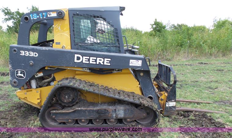 image for item L1579 2010 John Deere 333D skid steer