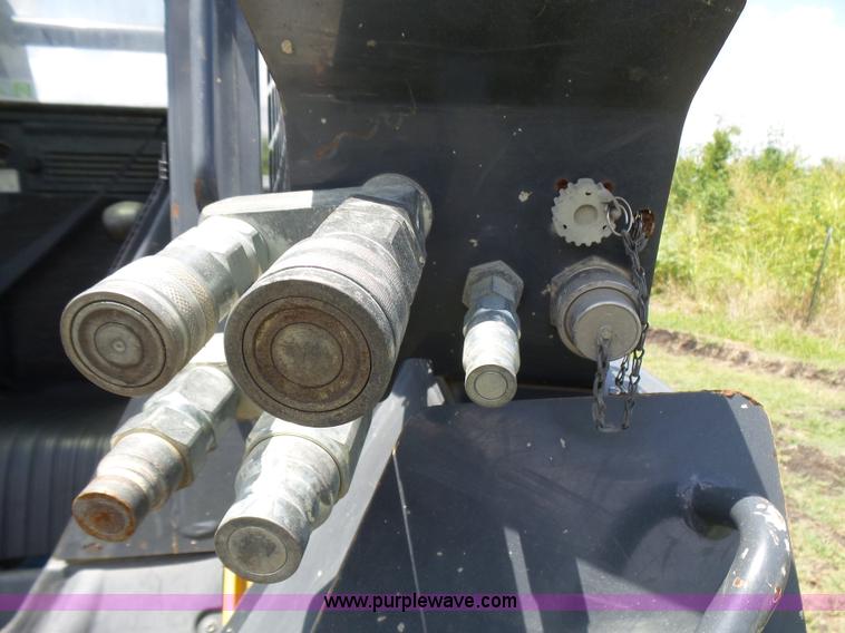 image for item L1579 2010 John Deere 333D skid steer