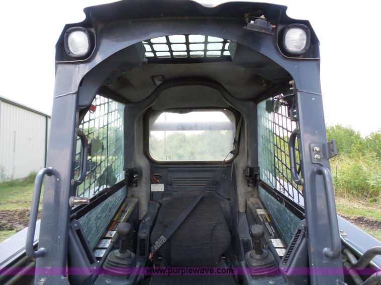 image for item L1579 2010 John Deere 333D skid steer