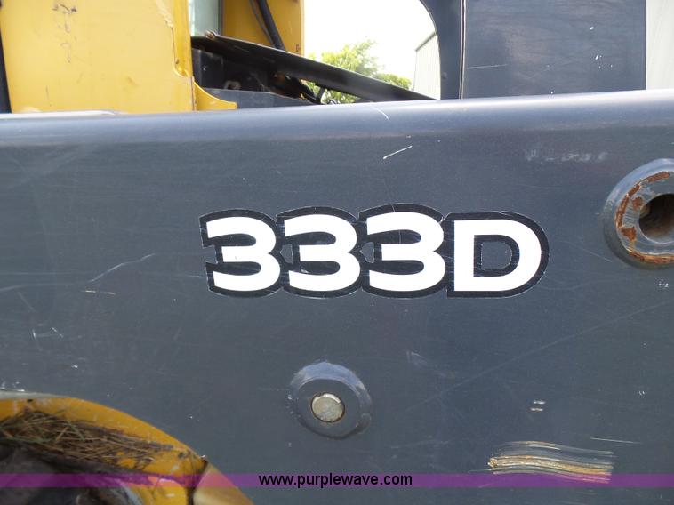 image for item L1579 2010 John Deere 333D skid steer