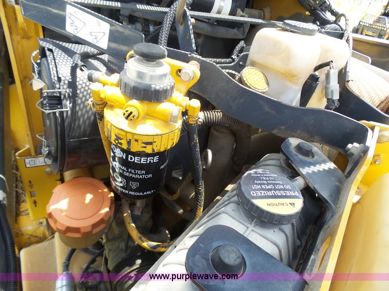 image for item L1579 2010 John Deere 333D skid steer