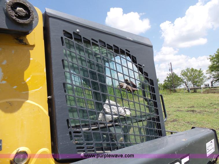 image for item L1579 2010 John Deere 333D skid steer
