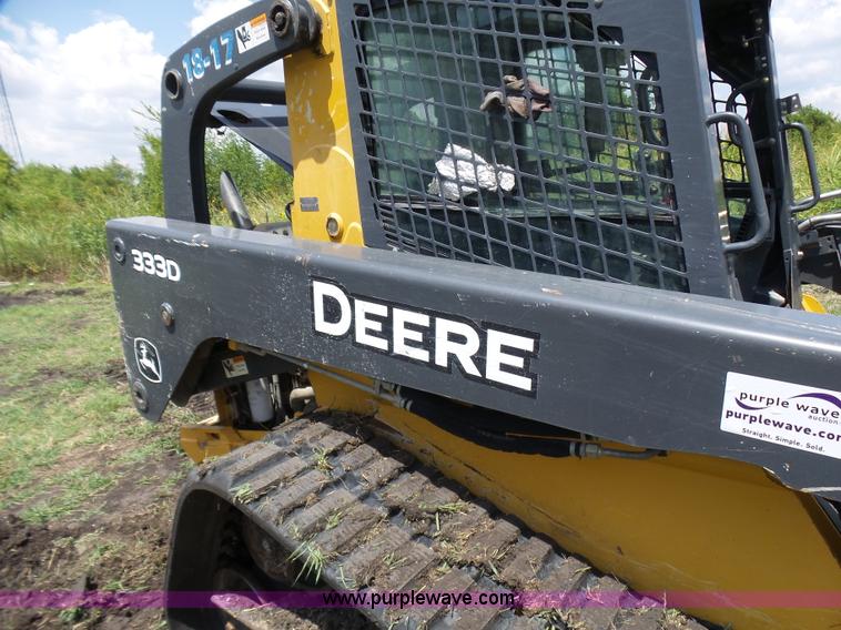 image for item L1579 2010 John Deere 333D skid steer